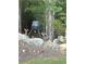 Wildlife featuring two deer next to the tree line in the backyard, perfect for nature enthusiasts at 247 Terrace View Dr, Acworth, GA 30101