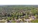 Beautiful aerial view of a suburban neighborhood with tree-lined streets and well-maintained homes at 370 Landing Entry, Johns Creek, GA 30022