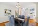 Dining room featuring a view to the living room, hardwood floors and modern decor at 370 Landing Entry, Johns Creek, GA 30022