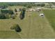 An aerial shot showcases the property and land, with plenty of room for activities at 14807 Highway 36, Covington, GA 30014