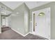 Inviting foyer with new paint, updated flooring, and natural light streaming in at 14807 Highway 36, Covington, GA 30014