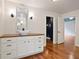 Bathroom with a vanity with vessel sink and views into the hallway at 1830 Lost Mountain Rd, Powder Springs, GA 30127