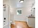 Bathroom showcasing modern fixtures and vanity with a vessel sink and wood countertop at 1830 Lost Mountain Rd, Powder Springs, GA 30127