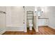 Bathroom featuring a tub, toilet, and vanity with wood countertop at 1830 Lost Mountain Rd, Powder Springs, GA 30127