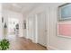 Hallway featuring hardwood floors and decor at 248 Madison Ave, Decatur, GA 30030