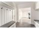 Hallway with built-in bench seating and open doorways leading to multiple rooms at 248 Madison Ave, Decatur, GA 30030
