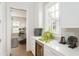 Bright kitchen featuring stone countertops, modern appliances, and hardwood floors throughout at 248 Madison Ave, Decatur, GA 30030