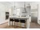 Bright kitchen with stone countertops, stainless appliances, and a center island with bar seating at 248 Madison Ave, Decatur, GA 30030