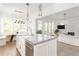 Open concept kitchen with stone countertops, stainless appliances, and seamless flow to living spaces at 248 Madison Ave, Decatur, GA 30030