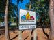McKoy Park sign surrounded by trees and foliage in a scenic park environment at 248 Madison Ave, Decatur, GA 30030