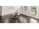 Bright dining area with backyard access and stylish hardwood floors at 2947 Knob Creek Dr, Snellville, GA 30078