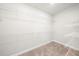 Walk-in closet with built-in wire shelves and carpeting at 2947 Knob Creek Dr, Snellville, GA 30078
