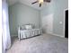 Bright bedroom with high ceilings features a bed, a closet, and large windows at 3515 Brandywine Nw Rd, Kennesaw, GA 30144