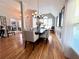 Bright dining room with hardwood floors, neutral walls, and stylish chandelier over the dining table at 3515 Brandywine Nw Rd, Kennesaw, GA 30144