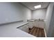Basement kitchenette features ample countertop space, white cabinets, and stainless steel sink at 3515 Brandywine Nw Rd, Kennesaw, GA 30144