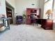 Spacious office features carpeting, a wooden desk, and a comfortable chair near a large window at 3515 Brandywine Nw Rd, Kennesaw, GA 30144