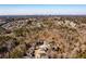 Expansive aerial shot capturing residential area with trees and city in the distance at 883 Heritage Pl, Decatur, GA 30033