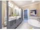Stylish bathroom with double vanities, soaking tub, and modern finishes at 883 Heritage Pl, Decatur, GA 30033