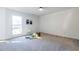 Bright bedroom with carpeted floor, white walls, windows, and natural light at 883 Heritage Pl, Decatur, GA 30033
