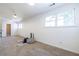 Spacious bedroom featuring carpet, natural light, and ample closet space at 883 Heritage Pl, Decatur, GA 30033