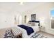 Airy bedroom with a comfortable bed, accent pillows, and natural light at 883 Heritage Pl, Decatur, GA 30033