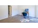 Bright bedroom featuring a cozy desk, a modern chair, and a sun-drenched floor at 883 Heritage Pl, Decatur, GA 30033