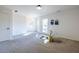 Bright bedroom with carpeted floor, white walls, windows, and natural light at 883 Heritage Pl, Decatur, GA 30033