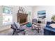 Cozy living room with a brick fireplace, plush seating, and bright windows at 883 Heritage Pl, Decatur, GA 30033