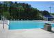 Outdoor pool with diving board and lounge chairs ready for summer relaxation at 883 Heritage Pl, Decatur, GA 30033
