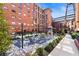Beautiful courtyard with fireplace, seating, and lush landscaping at 170 Boulevard Se # E003, Atlanta, GA 30312