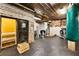 Workout area featuring a tanning bed, heavy bag, and exposed brick at 170 Boulevard Se # E003, Atlanta, GA 30312