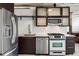 Well-equipped kitchen featuring stainless steel appliances, stylish cabinetry, and modern fixtures at 170 Boulevard Se # E003, Atlanta, GA 30312