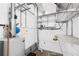 Functional utility room with water heater and storage shelving at 170 Boulevard Se # E003, Atlanta, GA 30312