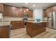 Kitchen with granite countertops, stainless steel appliances, and central island at 218 3Rd Ave, Avondale Estates, GA 30002