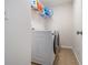 Modern laundry room with washer and dryer at 218 3Rd Ave, Avondale Estates, GA 30002