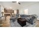 Spacious open-concept living room featuring hardwood floors and seamless flow into the kitchen and dining area at 218 3Rd Ave, Avondale Estates, GA 30002