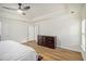 Large main bedroom with hardwood floors and a ceiling fan at 218 3Rd Ave, Avondale Estates, GA 30002