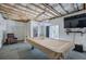 Finished basement featuring a pool table, TV area, and walkout access at 544 Pine Way, Dallas, GA 30157