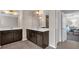 Bathroom featuring double sink vanity, tiled floors, access to bedroom at 544 Pine Way, Dallas, GA 30157