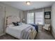 Comfortable bedroom with a four poster bed, and bright natural light at 544 Pine Way, Dallas, GA 30157