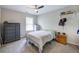 Bedroom featuring a window, neutral colors, and dresser at 544 Pine Way, Dallas, GA 30157