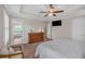 Bright and airy primary bedroom features trey ceiling, carpet, and an en-suite bathroom for convenience at 544 Pine Way, Dallas, GA 30157