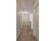 Neutral hallway featuring carpet and light walls at 544 Pine Way, Dallas, GA 30157