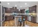 Well-equipped kitchen featuring granite countertops, stainless appliances, and dark cabinetry at 544 Pine Way, Dallas, GA 30157