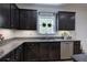 Well-appointed kitchen featuring granite countertops, stainless steel appliances, and ample cabinet space at 544 Pine Way, Dallas, GA 30157