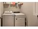 Bright laundry room featuring a washer and dryer at 544 Pine Way, Dallas, GA 30157