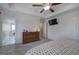 Serene main bedroom with plush carpet, tray ceiling, ensuite bath with soaker tub, and lots of natural light at 544 Pine Way, Dallas, GA 30157