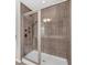 Tiled shower includes glass door, rain shower head, and multiple fixtures at 544 Pine Way, Dallas, GA 30157