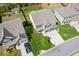 Aerial view captures the expansive backyard, home layout, landscaping, and surrounding neighborhood at 6435 Privet Way, Cumming, GA 30028
