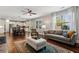 Open concept floor plan with living room and kitchen. Hardwood floors throughout at 6435 Privet Way, Cumming, GA 30028
